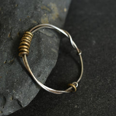 Walking in the Wild Silver and Brass Bangle